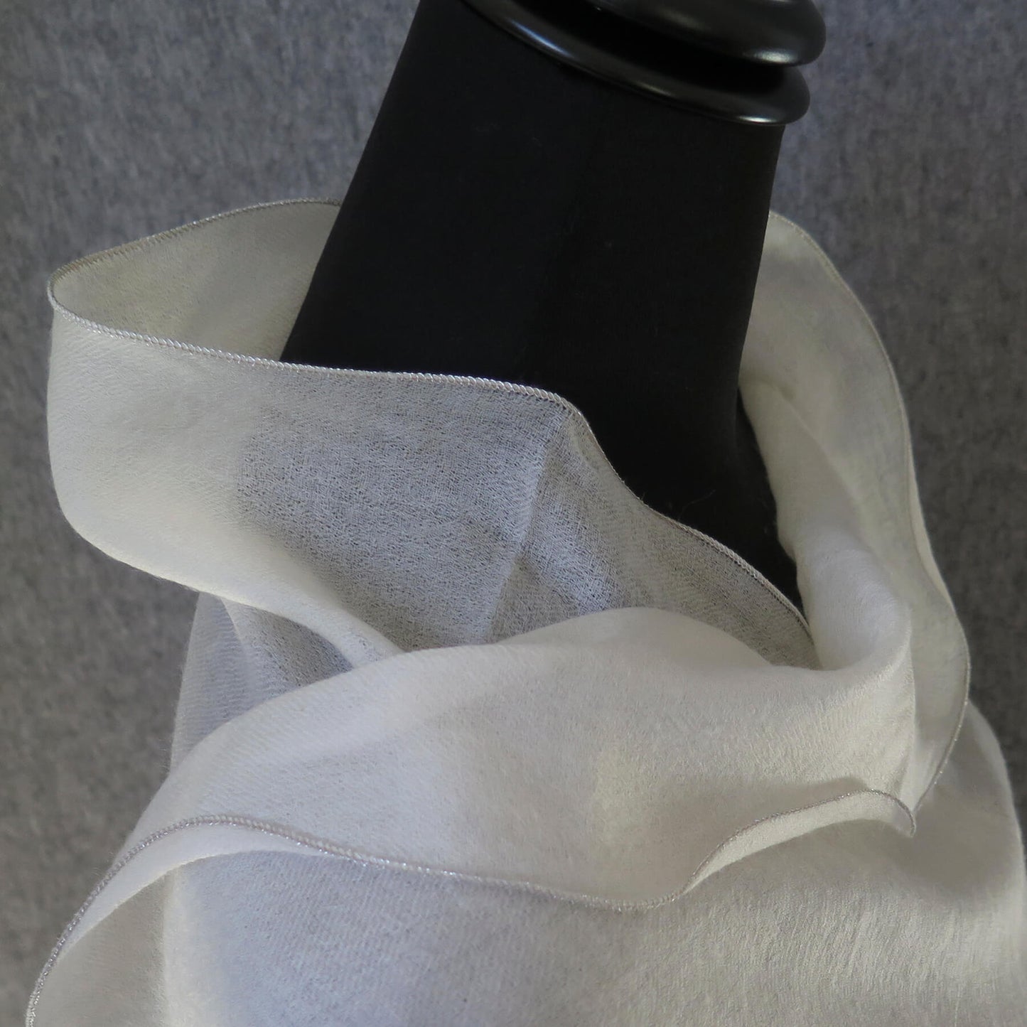 Luxurious Cashmere wrap. Light cream with fine silver waved edge