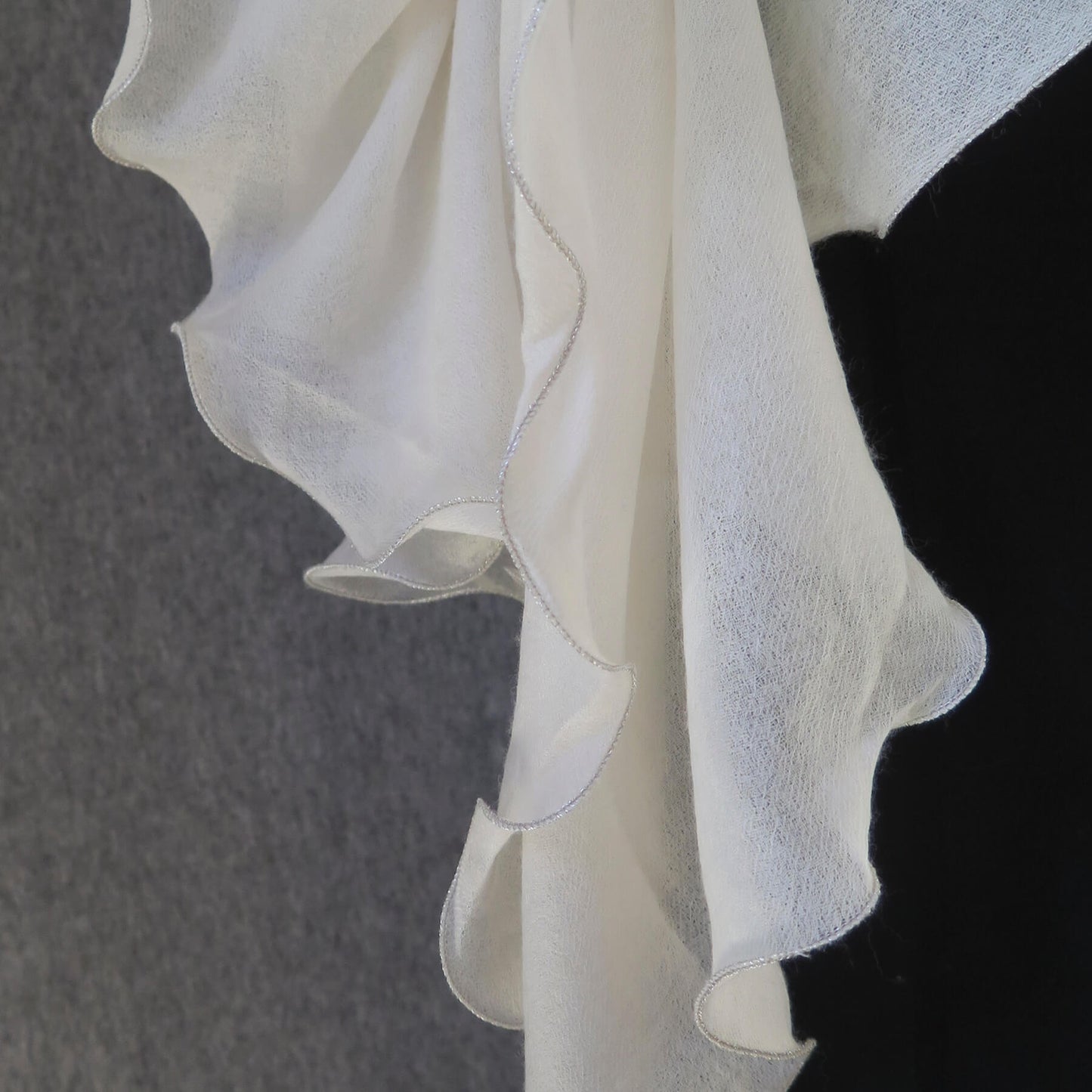 Luxurious Cashmere wrap. Light cream with fine silver waved edge