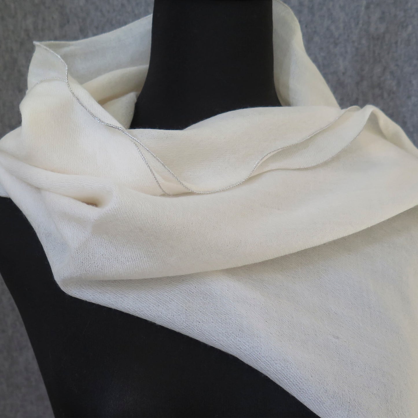 Luxurious Cashmere wrap. Light cream with fine silver waved edge